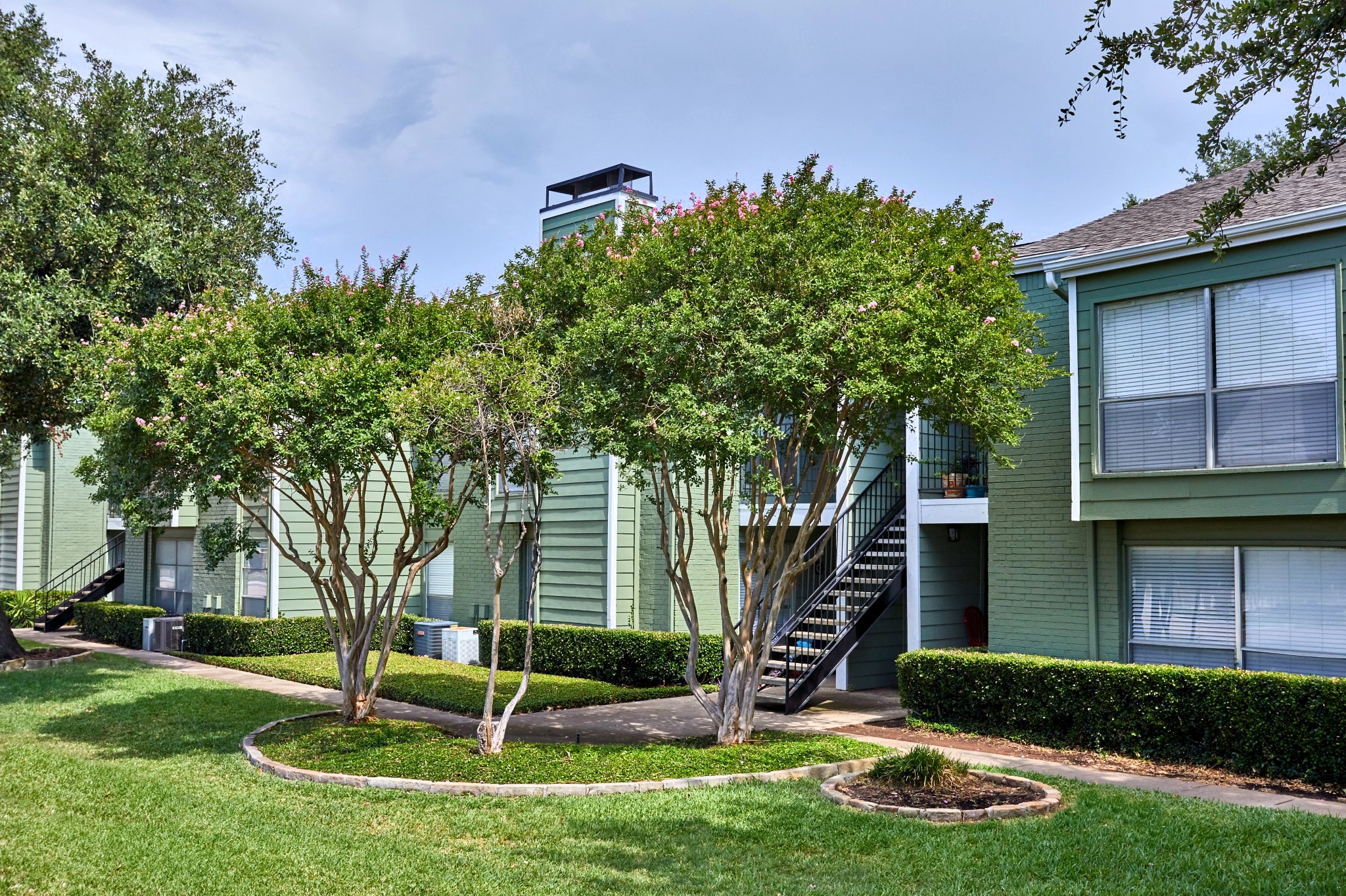 Beautifully Landscaped Grounds at The Jade Apartments in Addison, Texas, TX