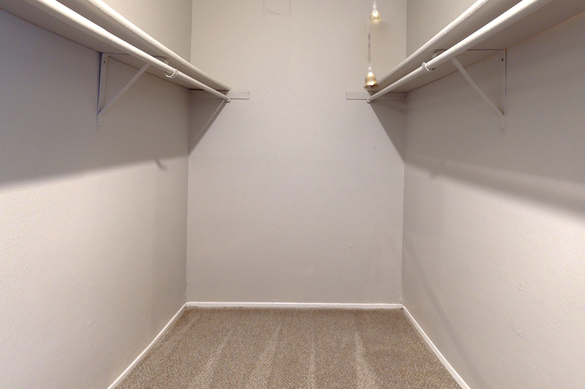 Walk In Closet at Jade Apartments in Addison, Texas