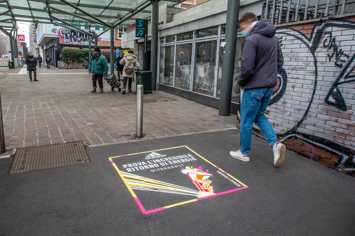 green graffiti advertising adidas ultraboost