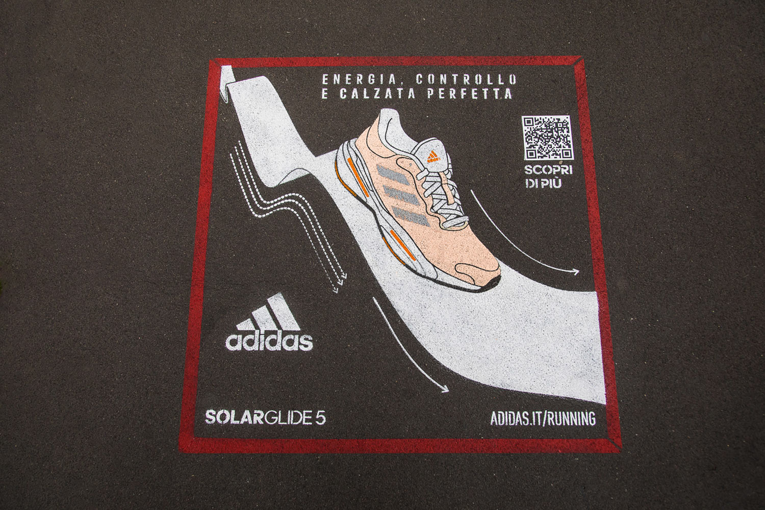 green graffiti advertising adidas Solar Glide 5