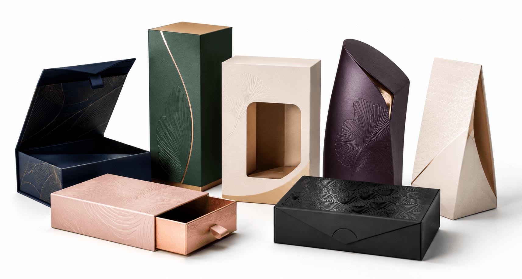 Elegant specialty cartons in various shapes and colors with embossed floral and geometric patterns.