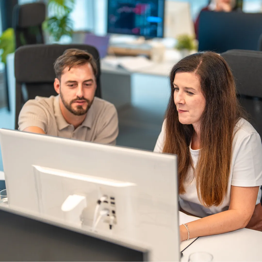 Jameco Group accountants reviewing financial information together