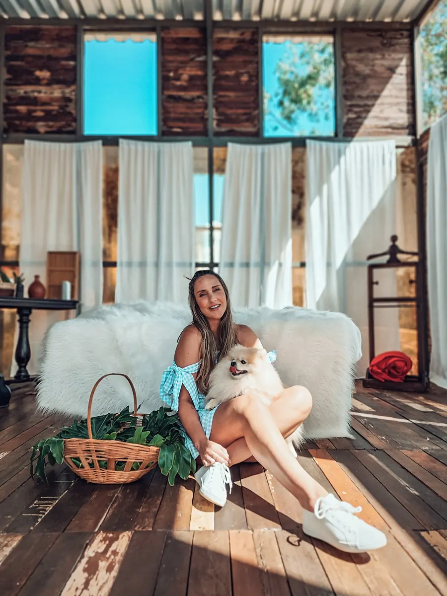 A person at home with their dog