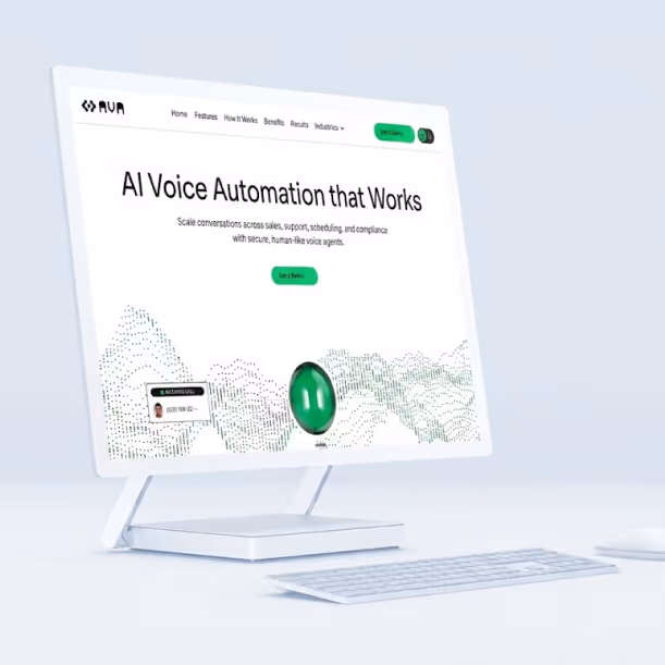 Computer screen showing AI voice automation software website with keyboard on white desk.