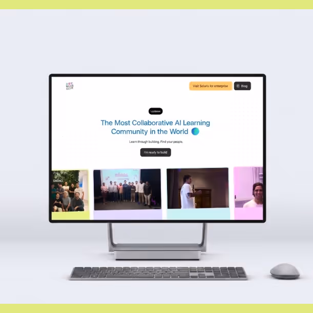 Desktop computer displaying a collaborative AI learning community website with photos and navigation buttons.