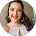 Smiling woman in casual professional attire, likely an IT support specialist or MSP team member at Kelser Corporation