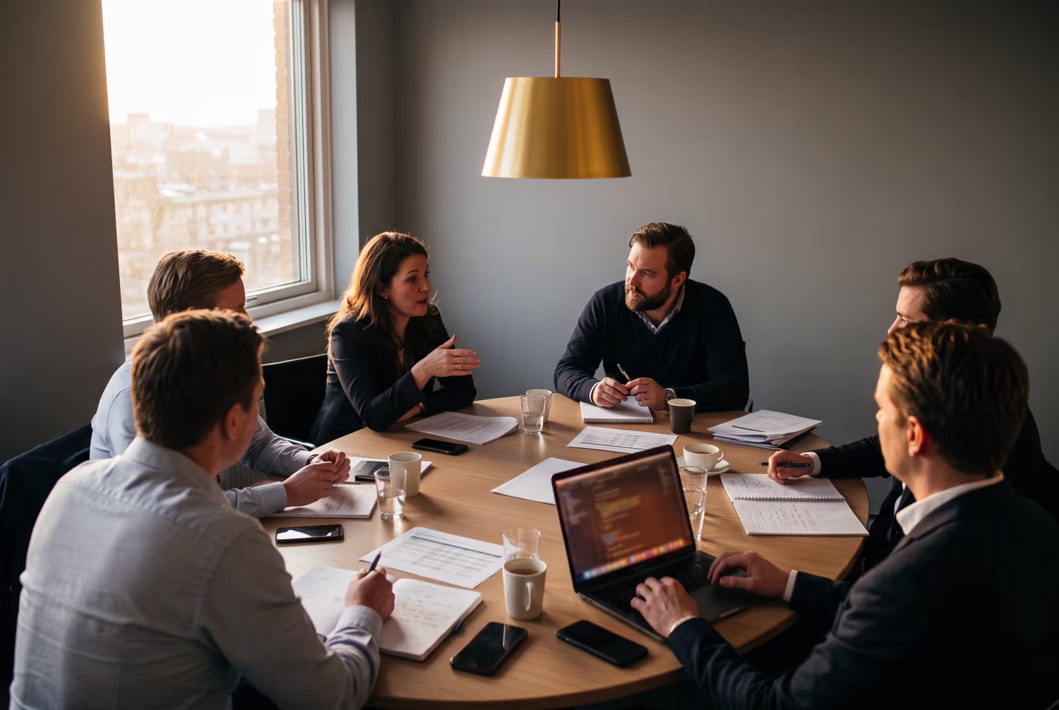 Professionals in meeting discussing managed service provider