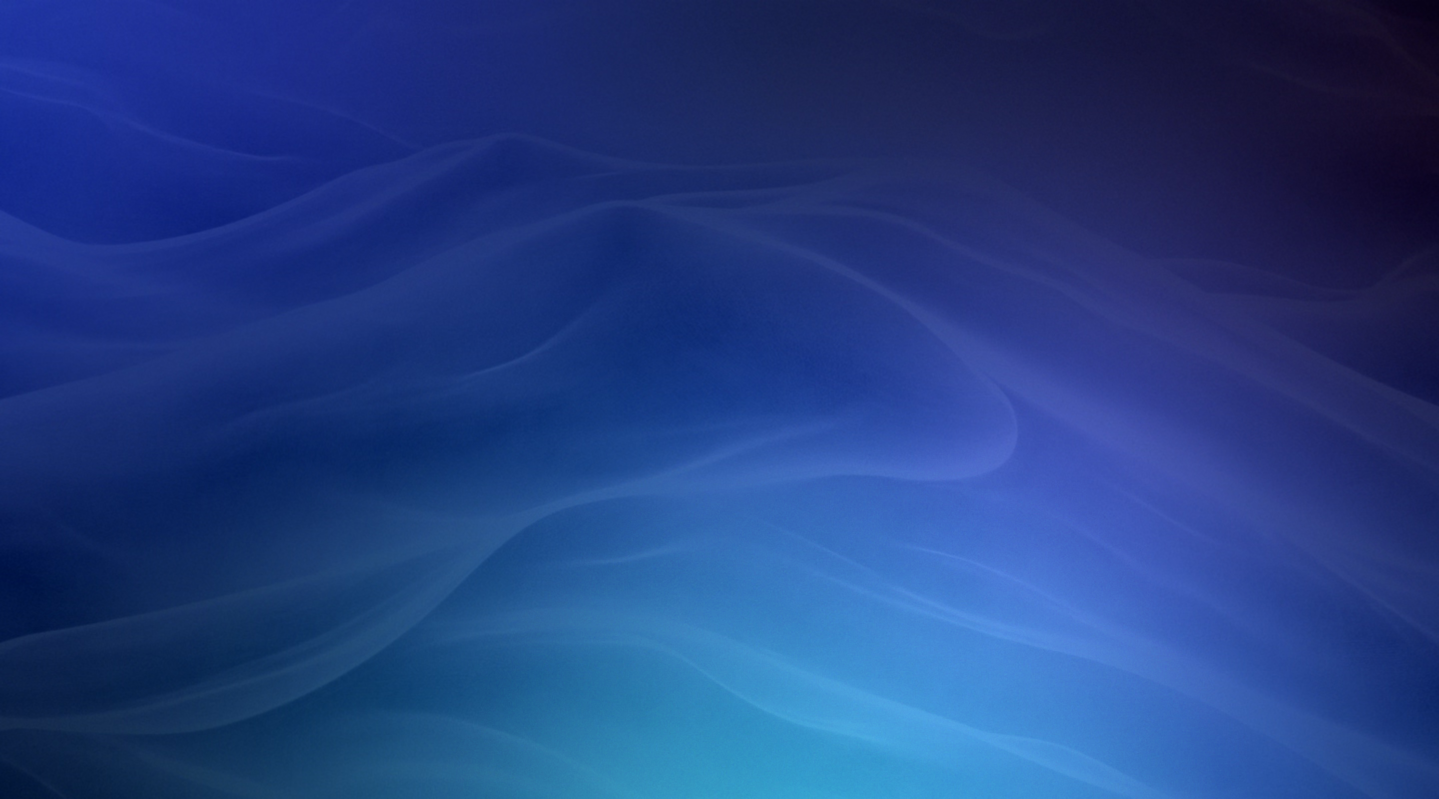 Abstract blue gradient background with flowing wave patterns and light effects