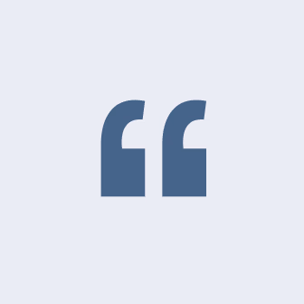 Quotation mark symbol in dark blue on light gray background