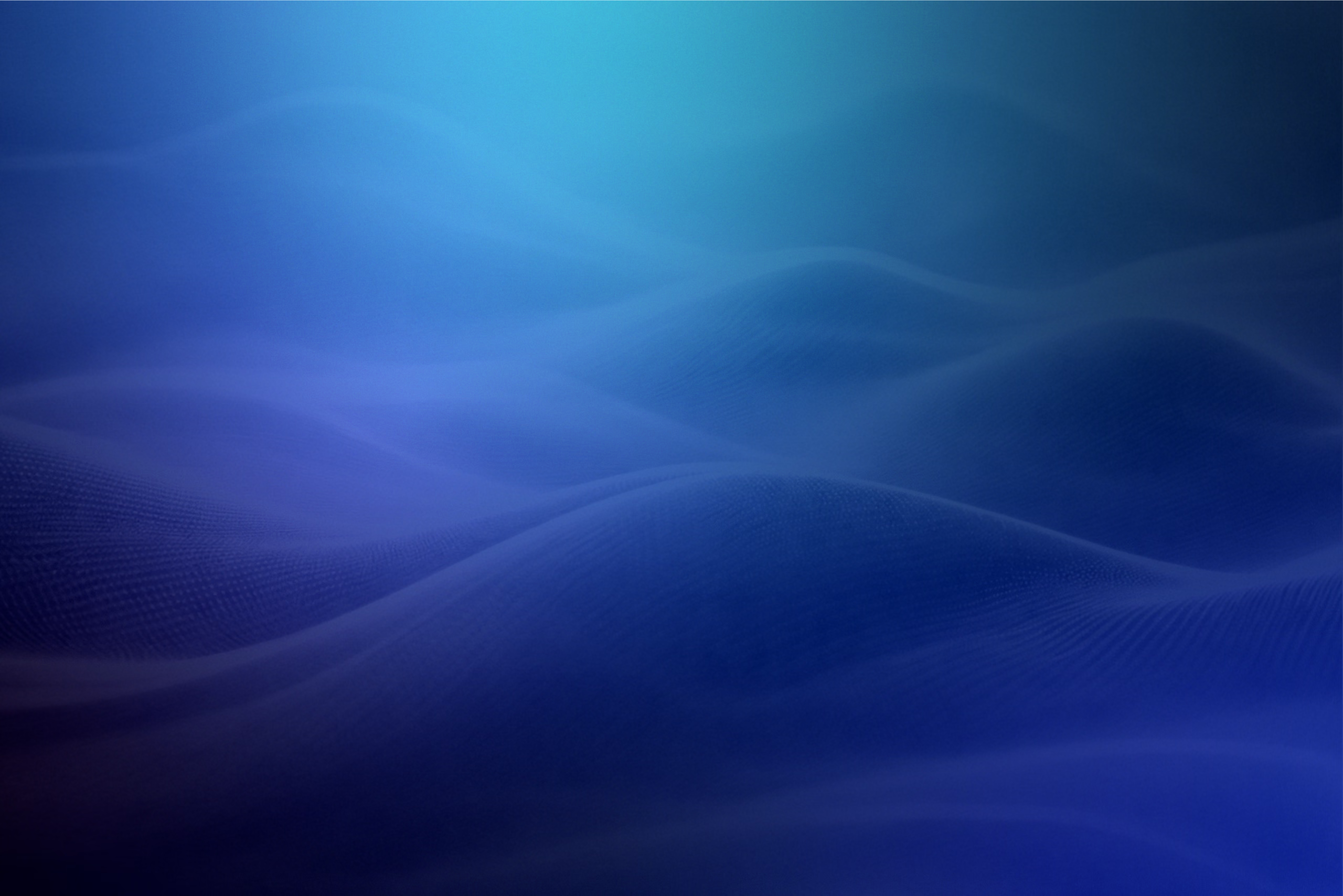 Abstract blue gradient background with smooth flowing wave patterns and soft lighting effects