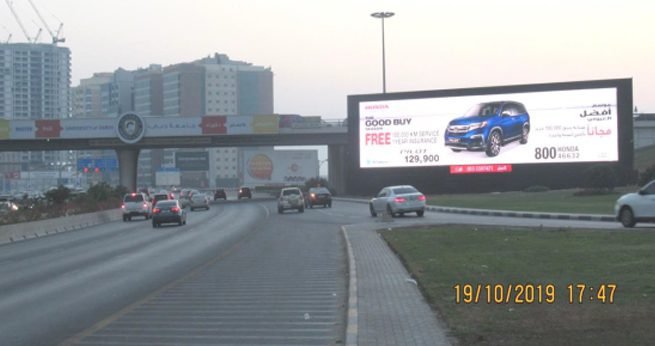 Elevated roadside advertising display in Dubai