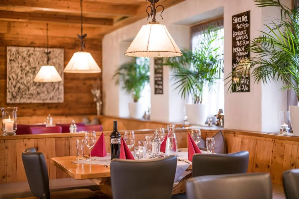 Edelweiss cozy wooden restaurant interior at the central Mayrhofen hotel.