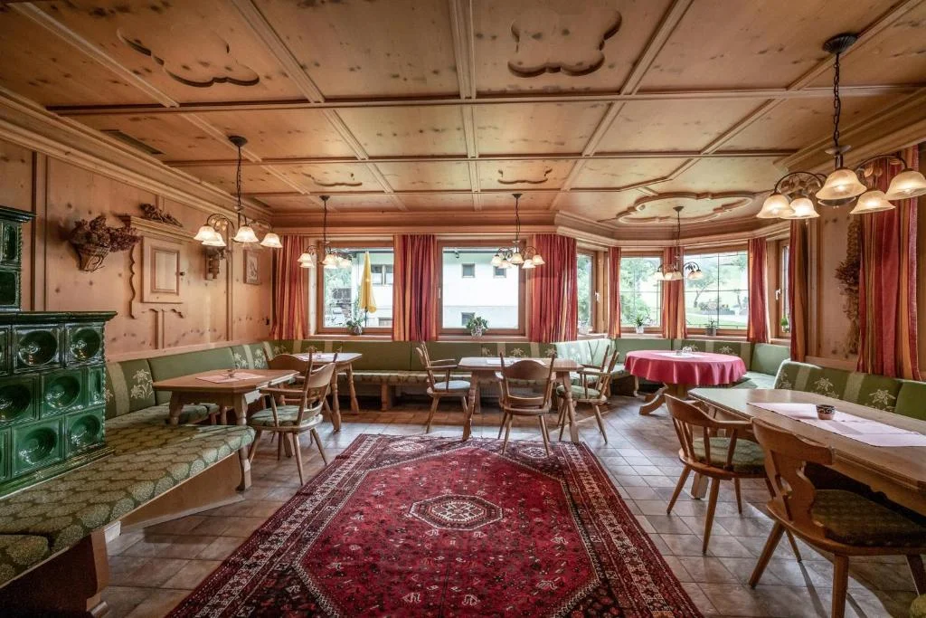 Kumbichlhof traditional alpine dining room at the family-run Mayrhofen farmhouse.