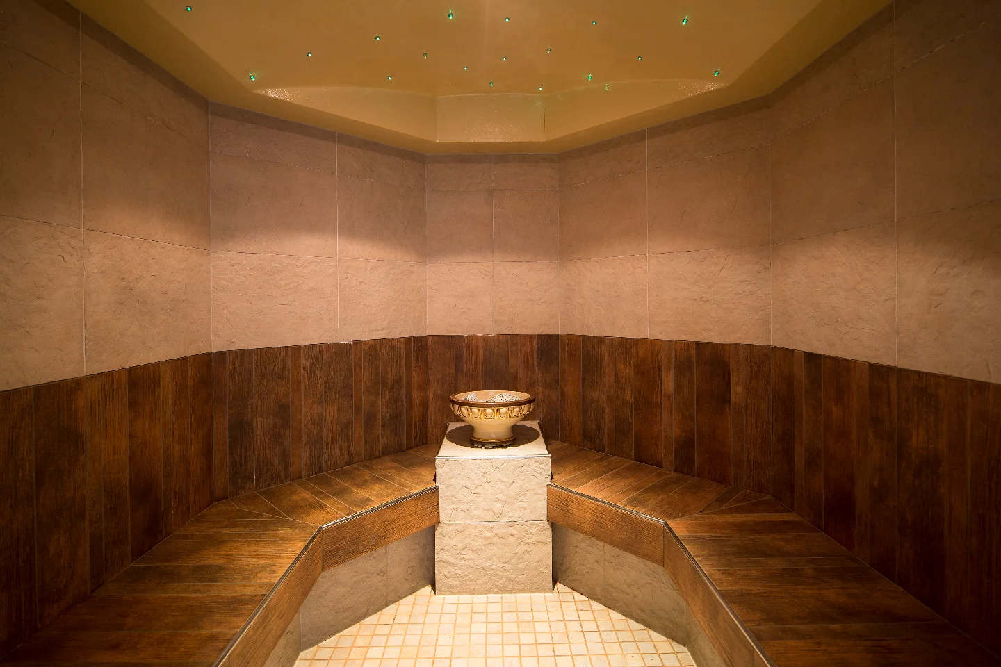 Jägerhof wooden-walled sauna room at the Mayrhofen three-star hotel.