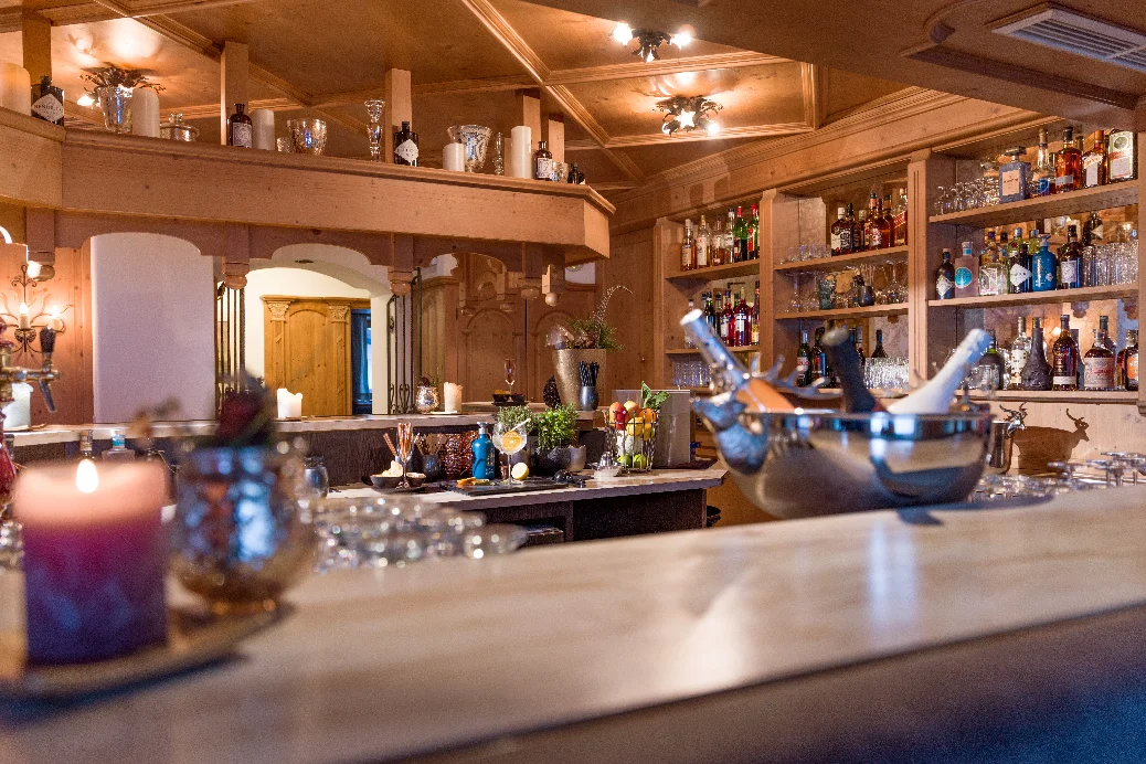 Jägerhof wooden bar lounge and restaurant at the Mayrhofen three-star hotel.