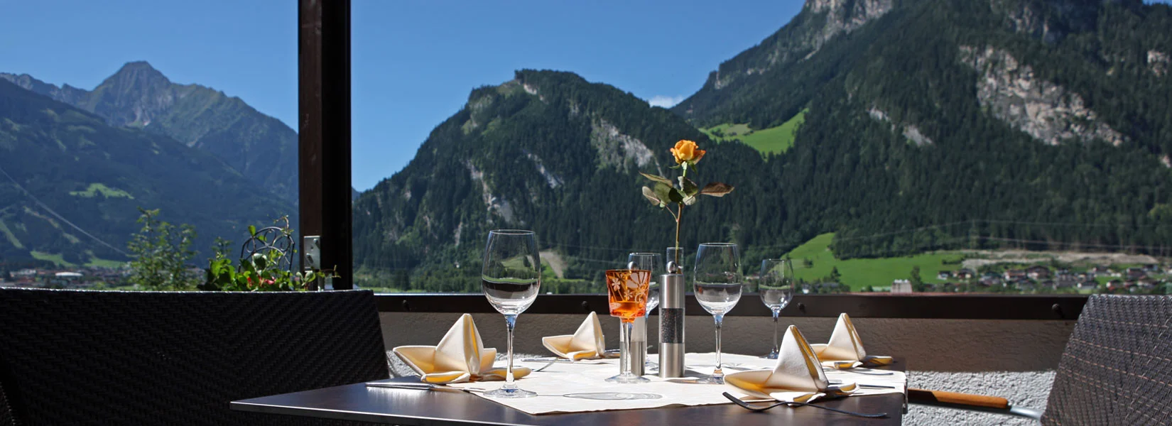 Eckartauerhof mountain-view dining table at the Edge of Town hotel near Mayrhofen.