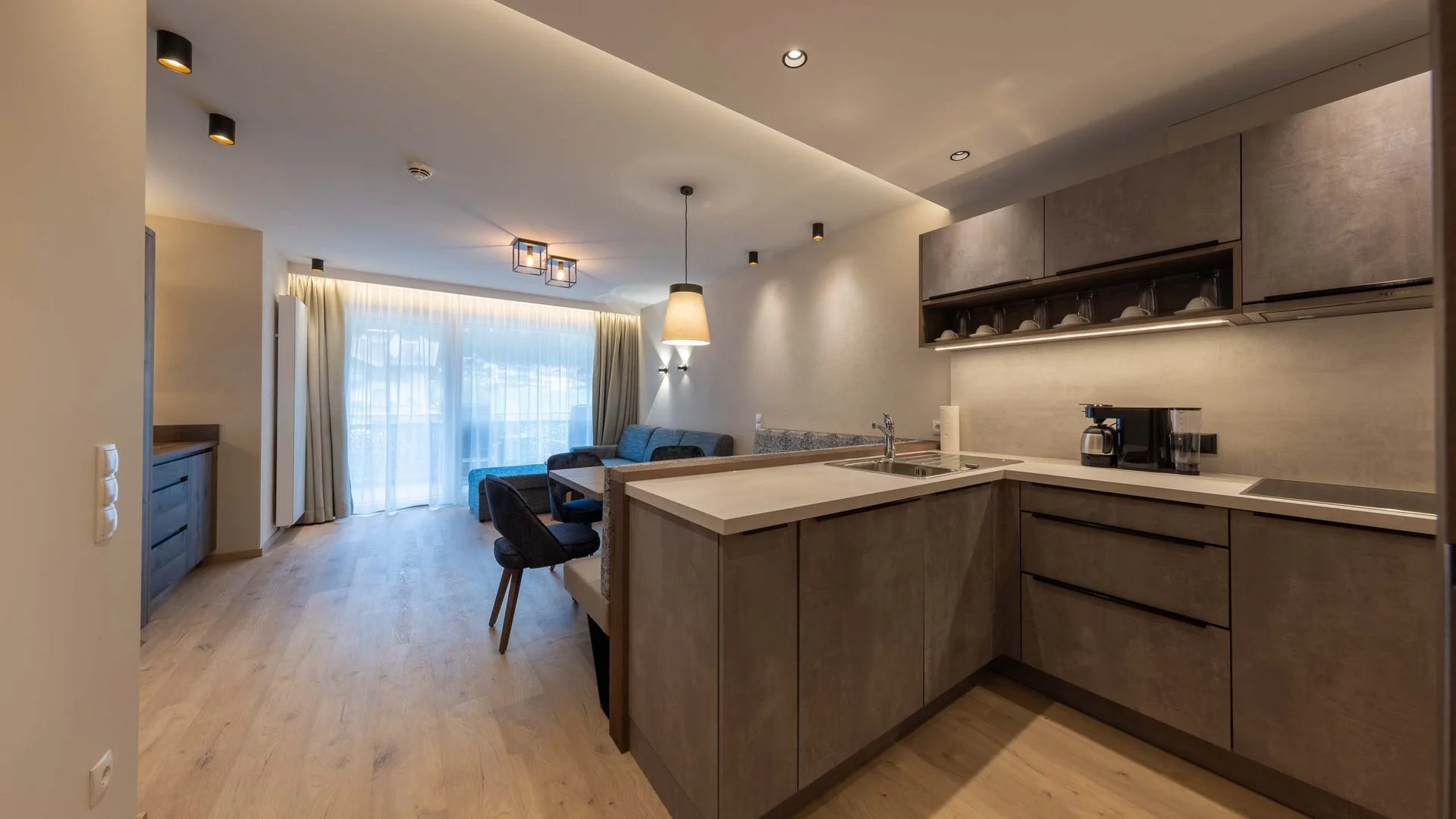 Strass Apartments modern kitchen and living room in the central Mayrhofen self-catered unit.