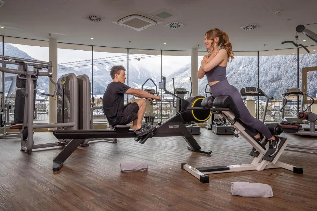 Hotel Strass gym session with mountain view at the Mayrhofen Sport and Spa.