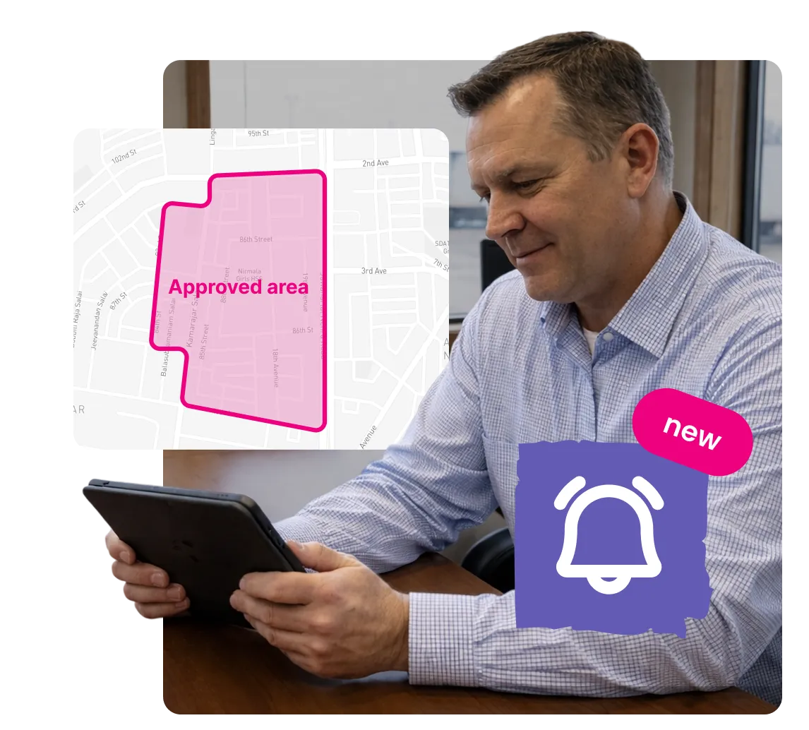 Man in a blue checkered shirt holding a tablet with an overlay showing a map highlighted in pink labeled 'Approved area' and a notification bell icon marked 'new'.