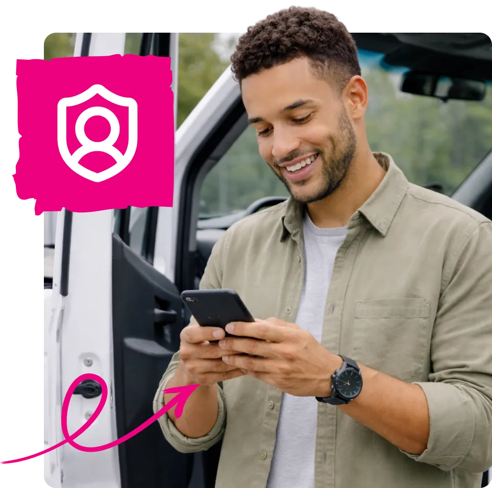 Smiling man standing beside an open white car door, looking at his smartphone with a pink icon of a shield and person overlayed.