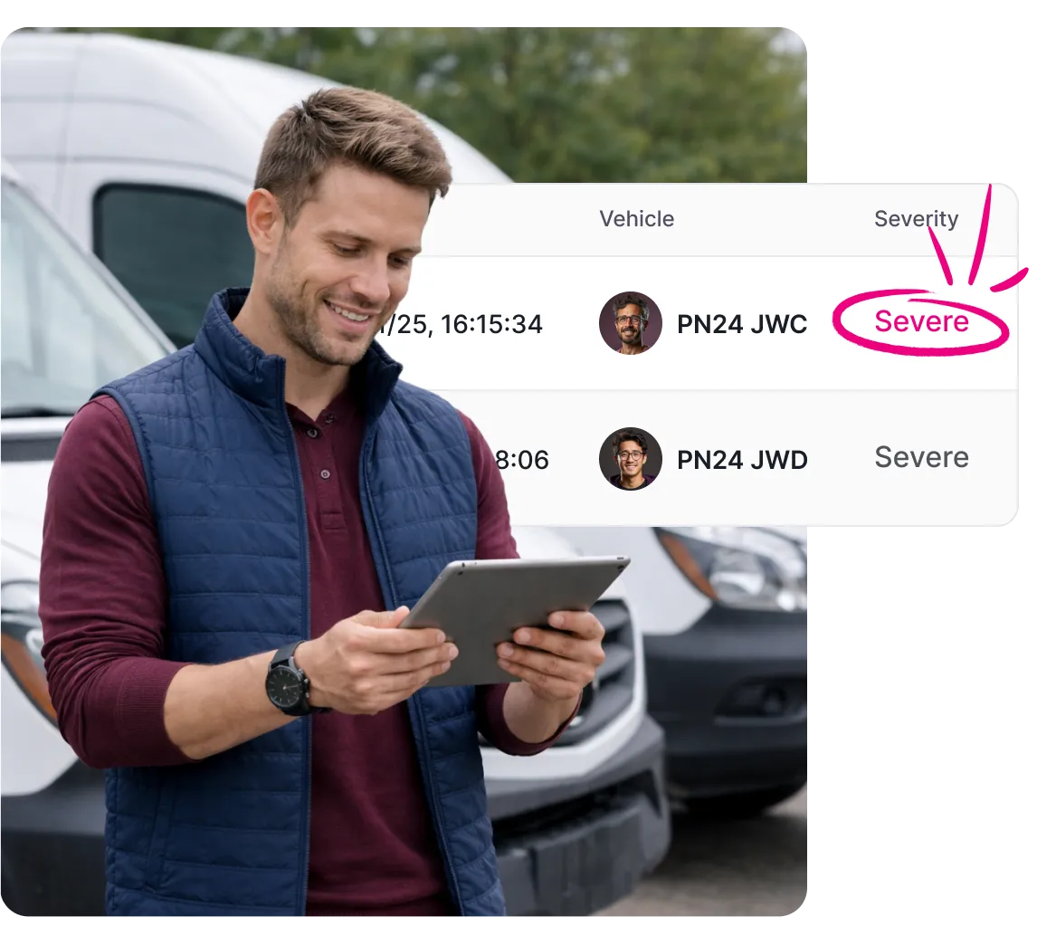 Man standing outdoors near white vans, smiling while holding and looking at a tablet showing a list with vehicle details and severity marked as severe.
