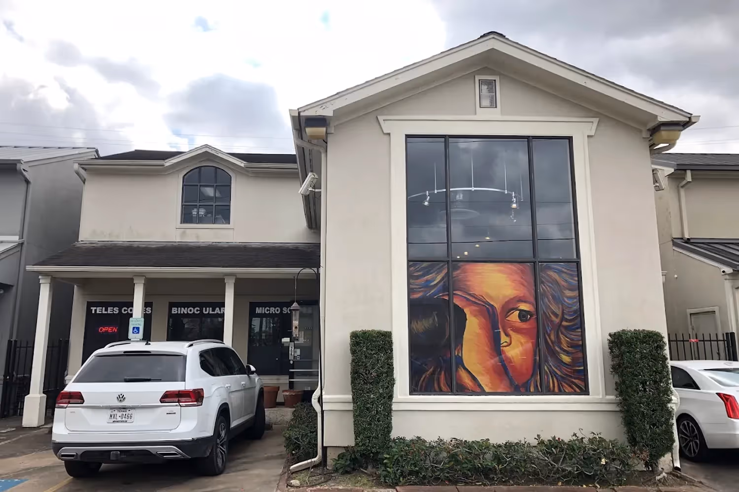 Land, Sea & Sky shop exterior with a vehicle parked outside
