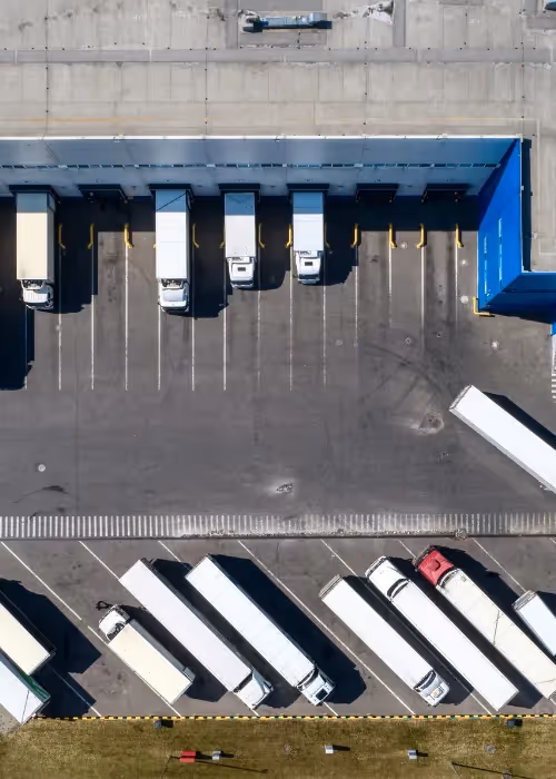 Trucks lined up in a row at a depot