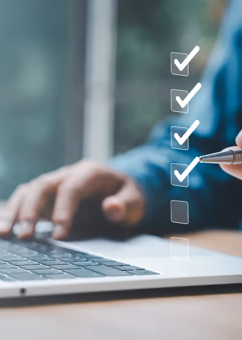 checklist in front of laptop