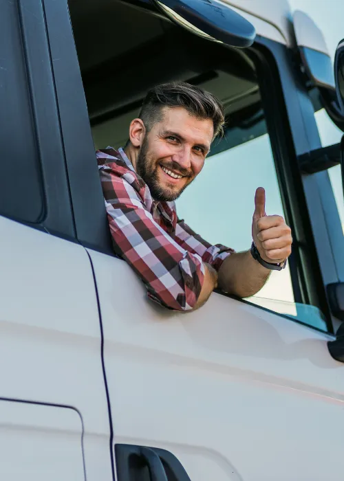 trucker smiling out window