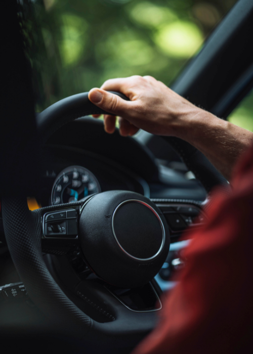 Person driving a car