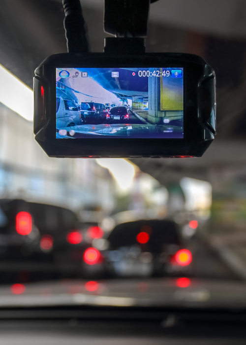 Image of view through dashcam on busy road
