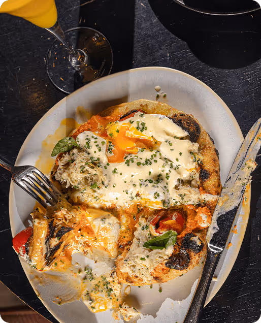 A flat bread placed on the dish.