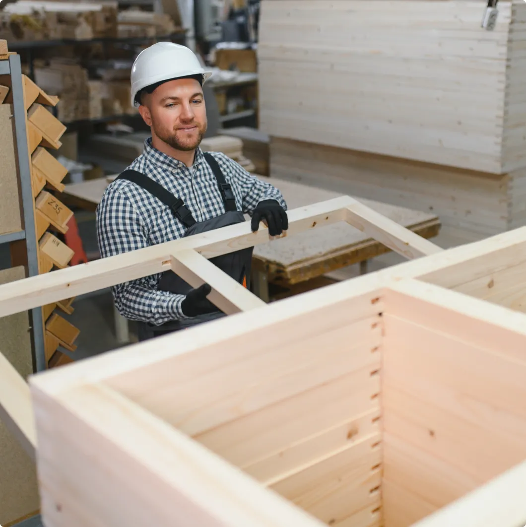 Carpenter building a wooden crate