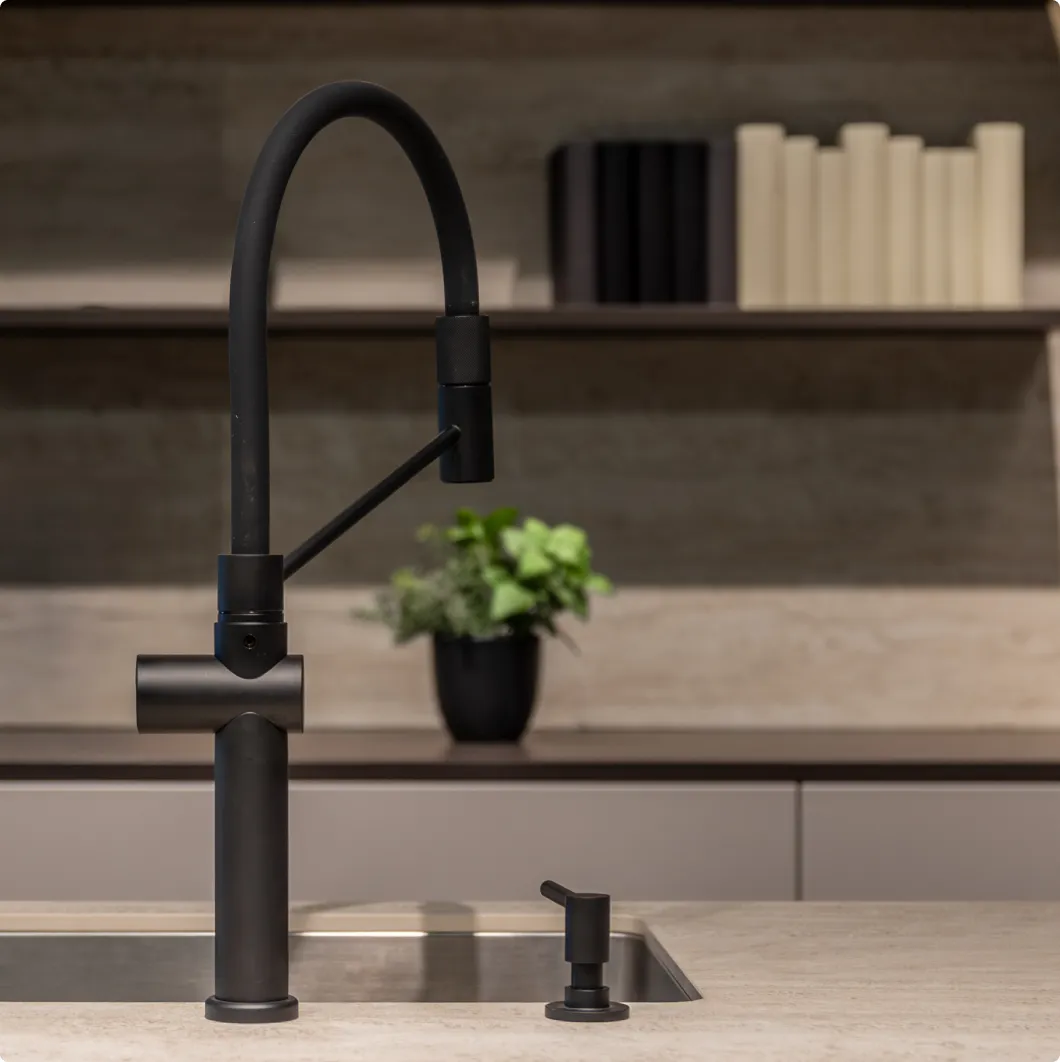 Modern kitchen tap over a sink