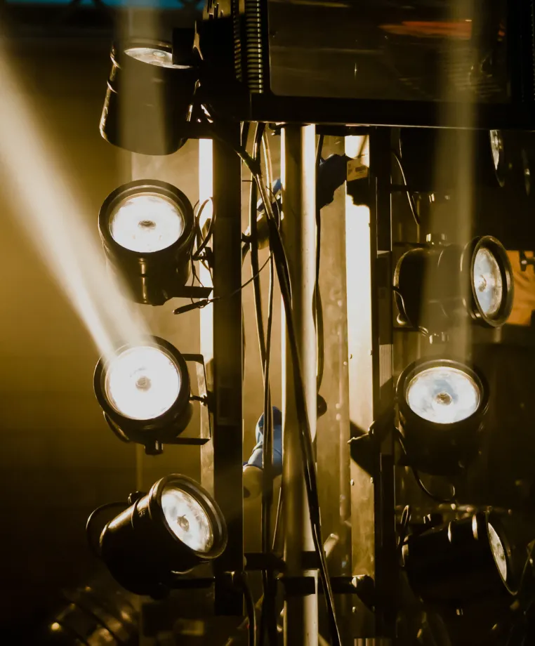 Theatrical spotlights on a lighting rig