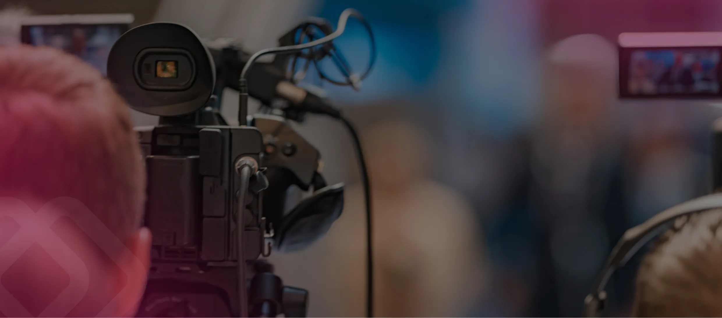 Camera operator filming an event