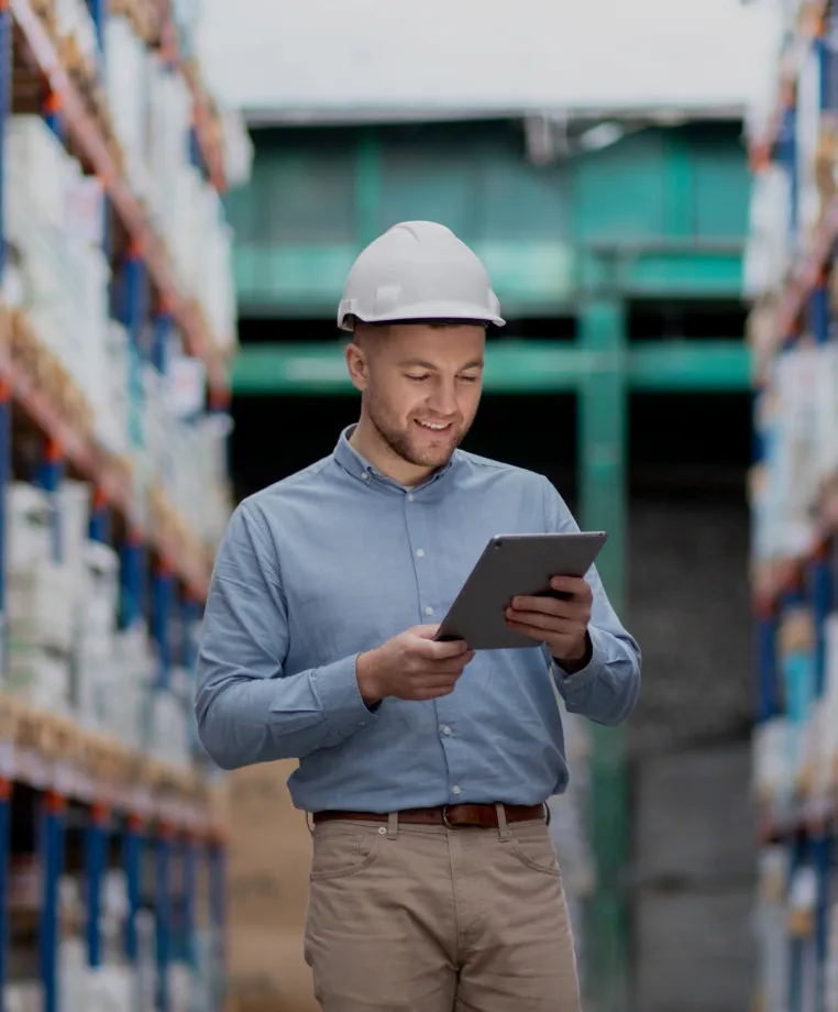 Man using a tablet in a warehouse