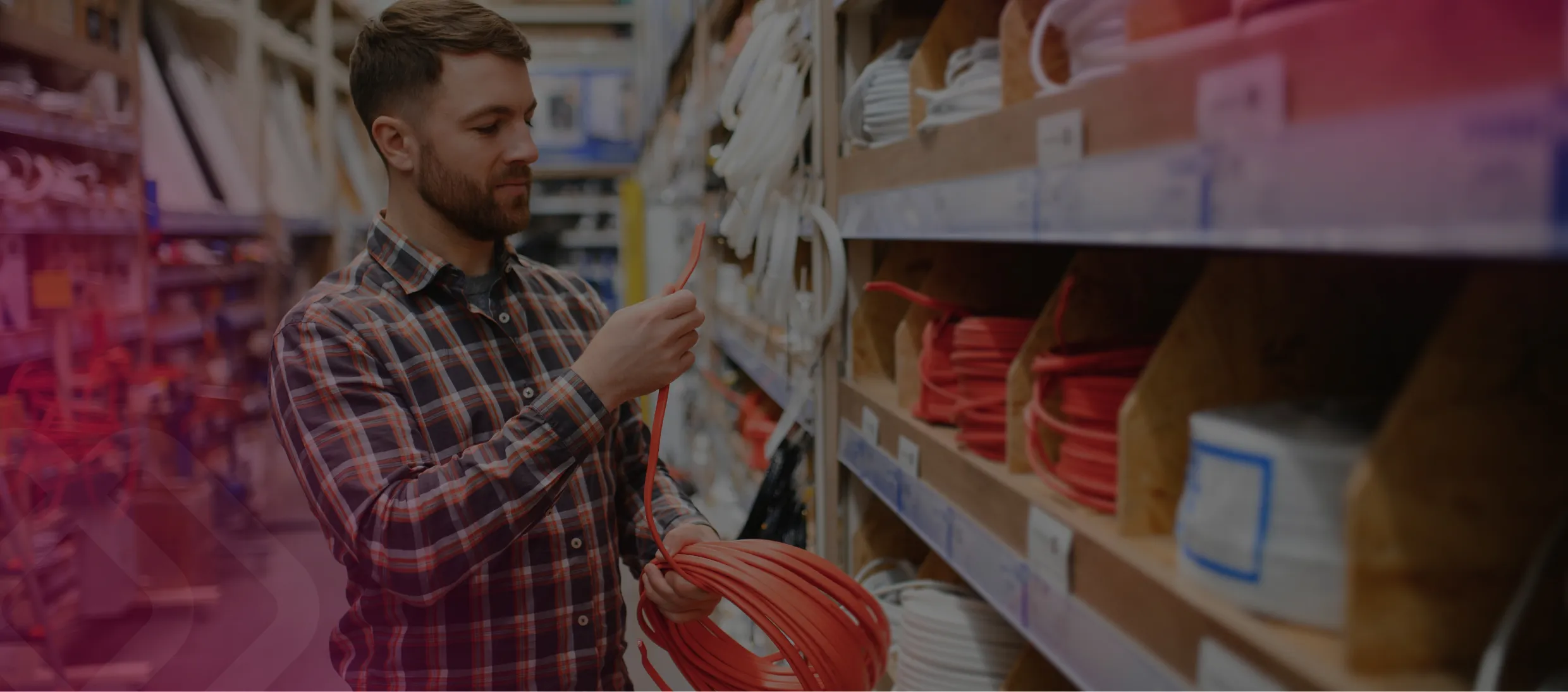 Man stocking shelves in a hardware store