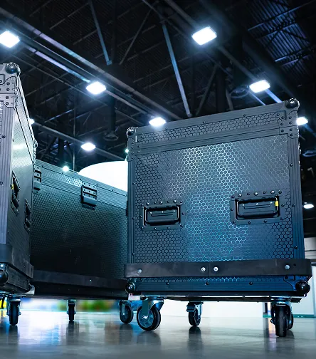 Flight cases on wheels in a venue