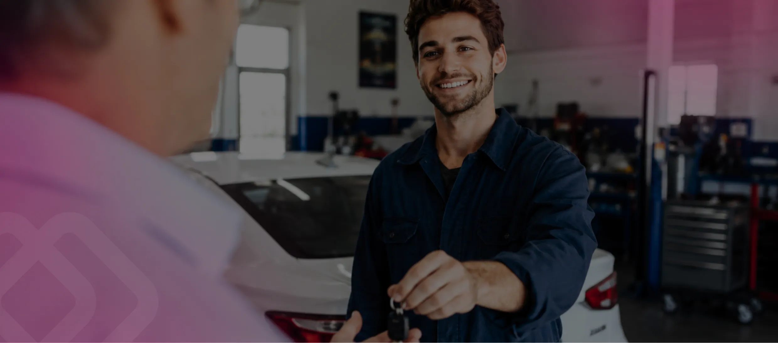 Smiling mechanic in a workshop