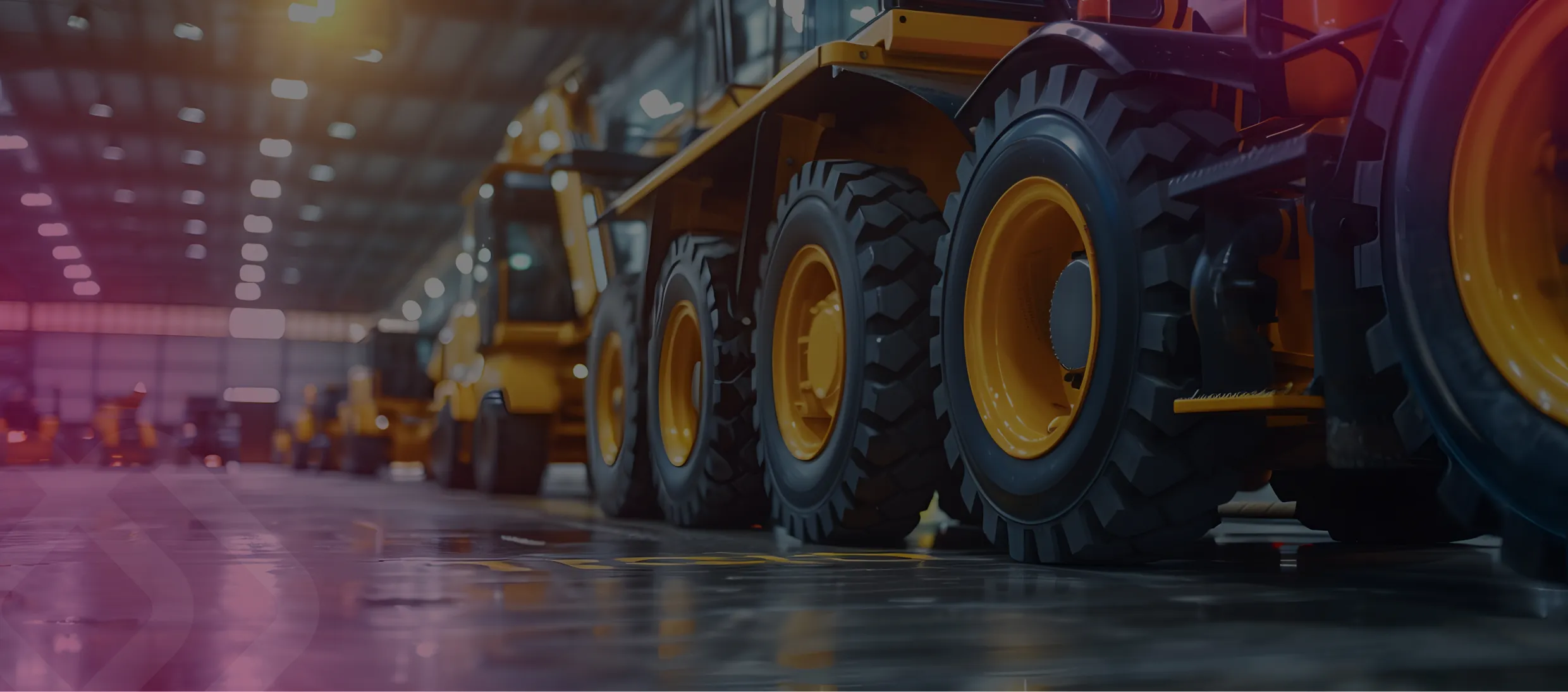 Row of heavy dump trucks in a depot