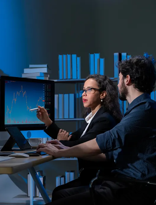 Woman presenting charts on a screen