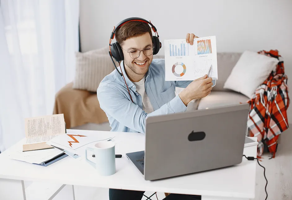 Man with a headset presenting a chart
