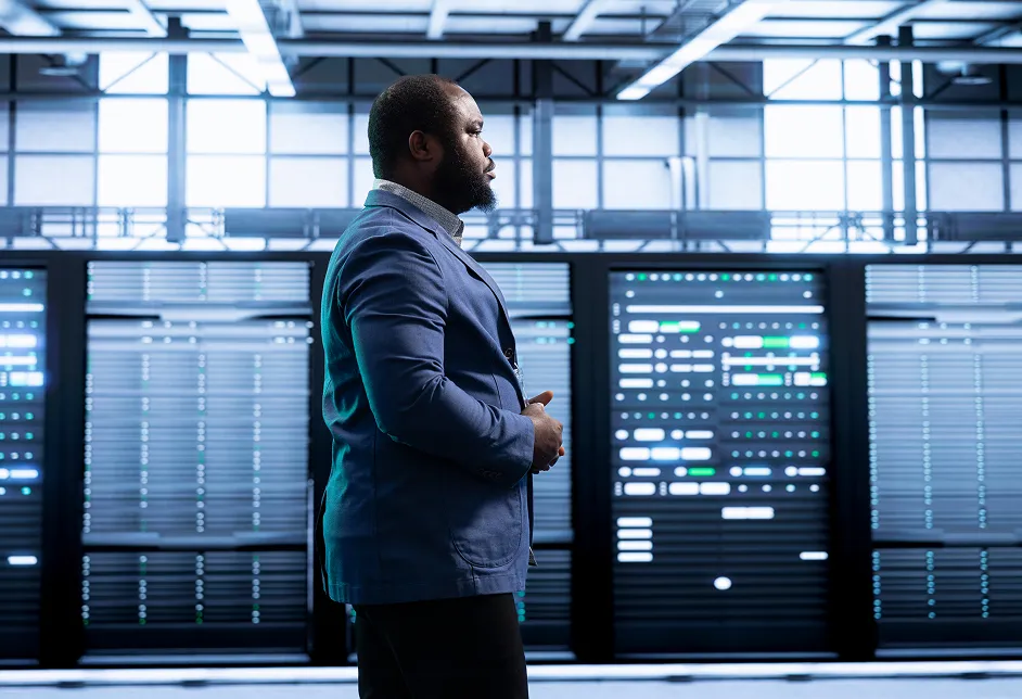 Man standing in a data centre