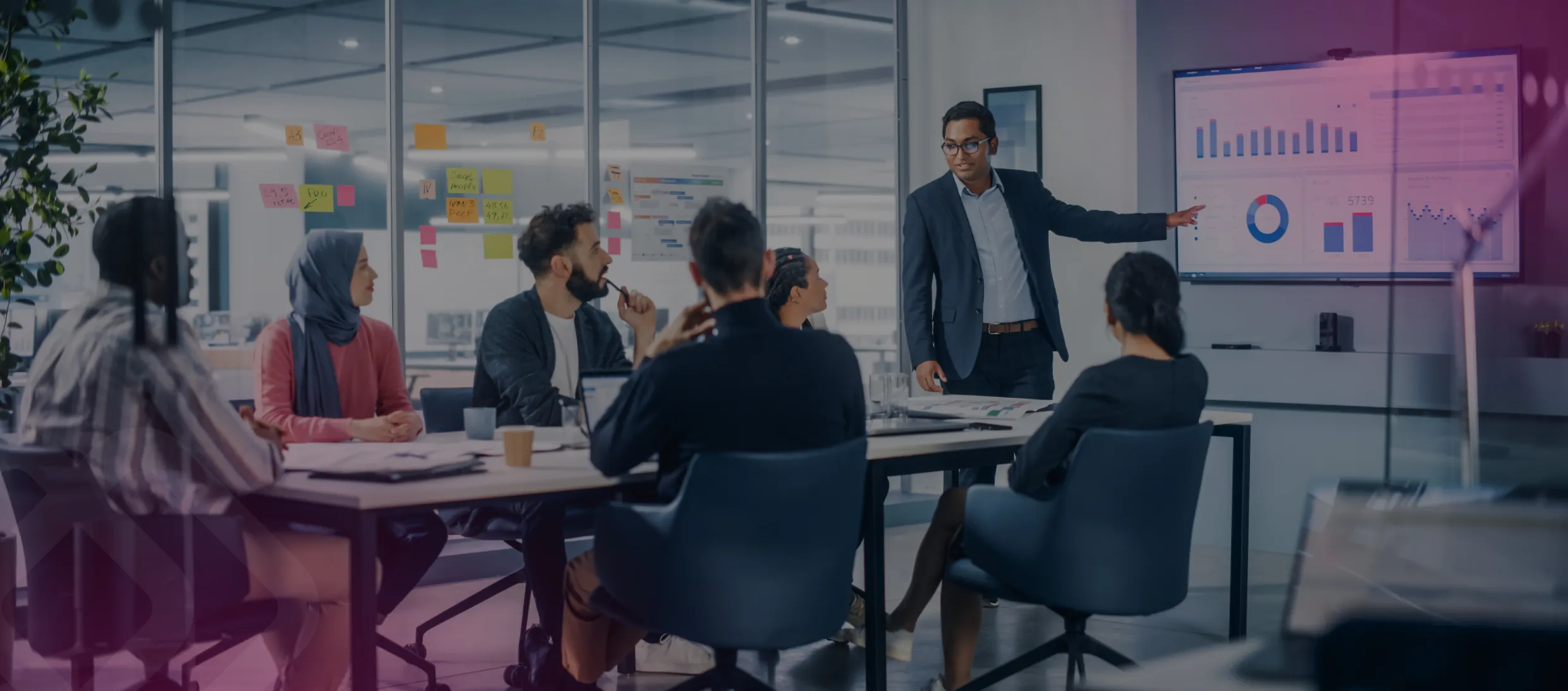 Presenter addressing a boardroom