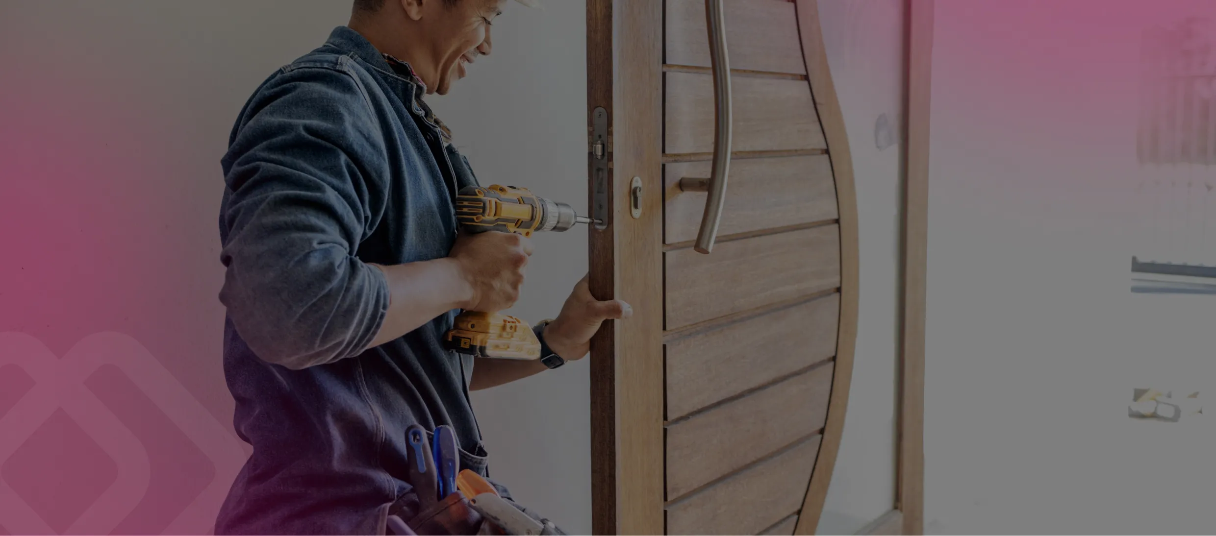 Worker fitting a door