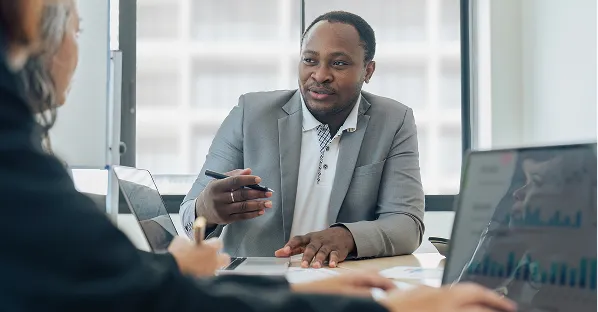 Businessman presenting to colleagues