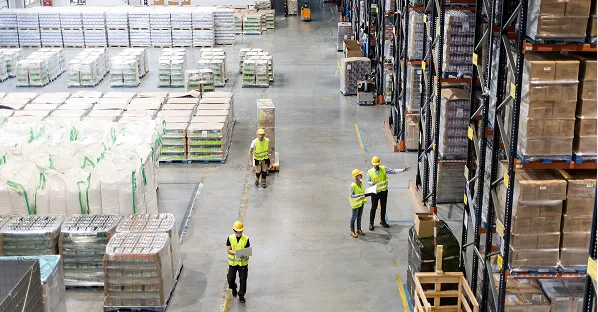 Overhead view of a warehouse with stacked goods