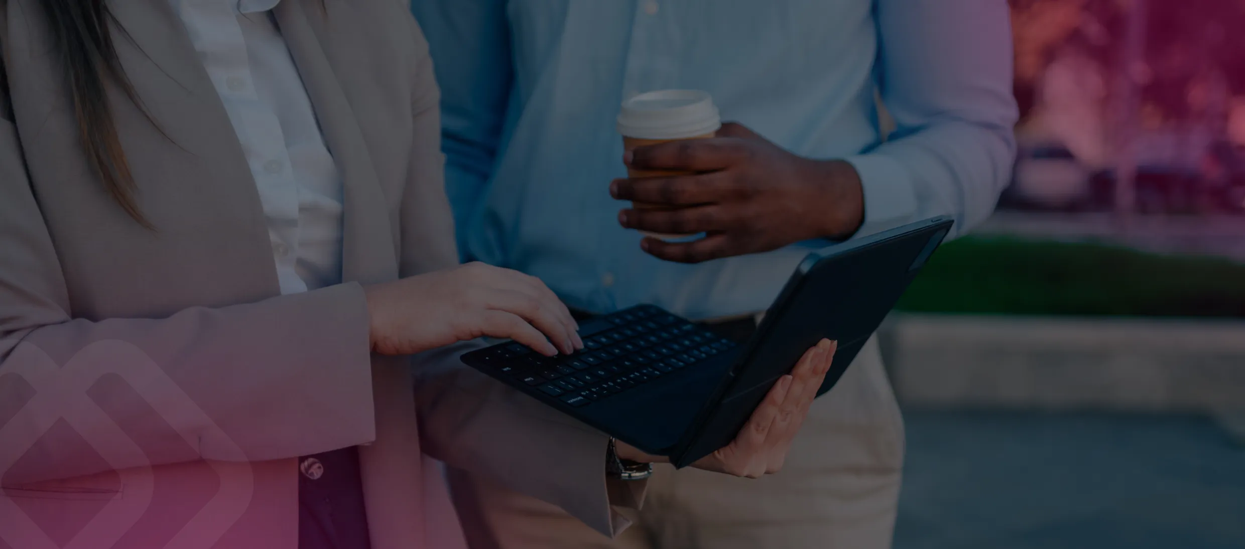Two colleagues with a laptop