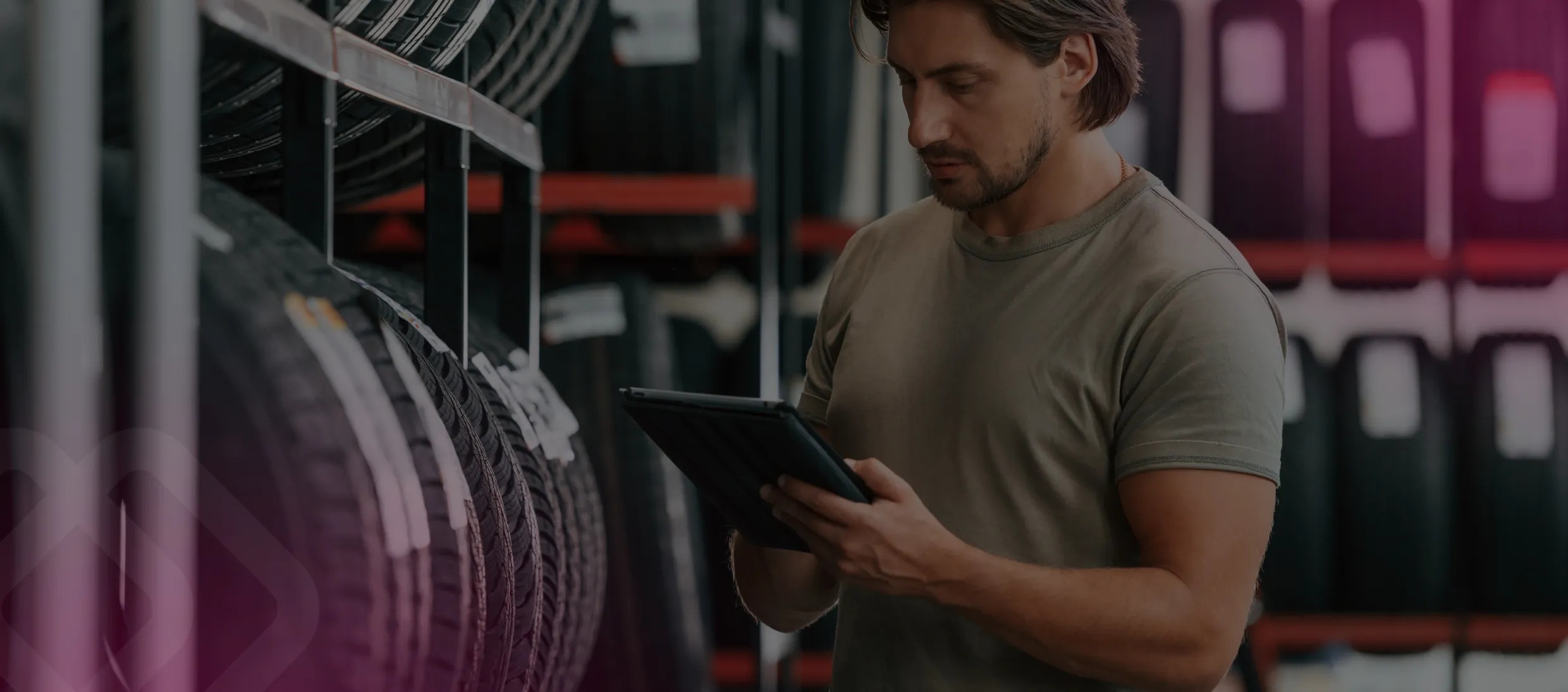 Worker with a tablet at storage shelves